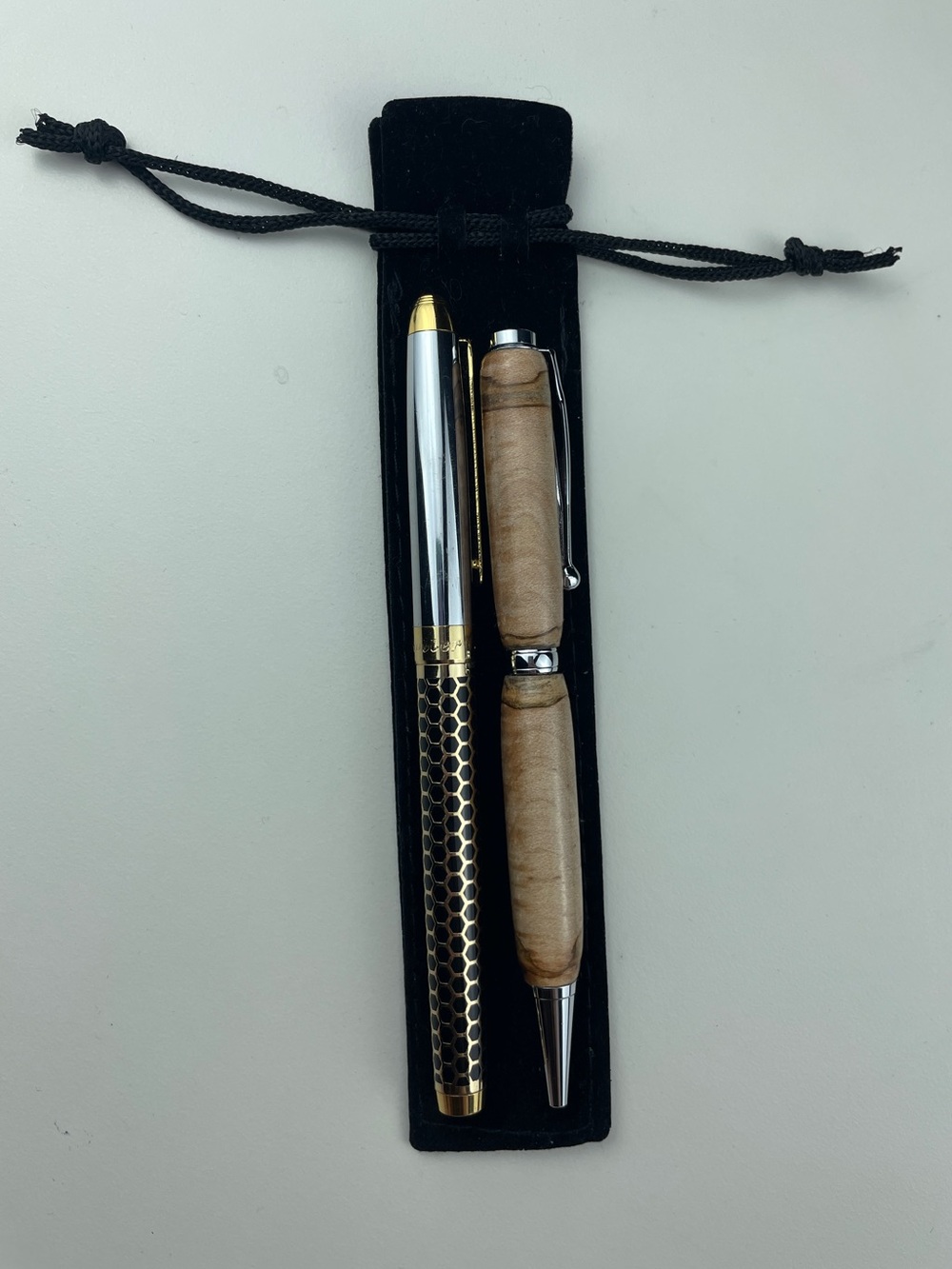 2 pens hand made lathed wood brown tan w- bag and metal honey comb black silver